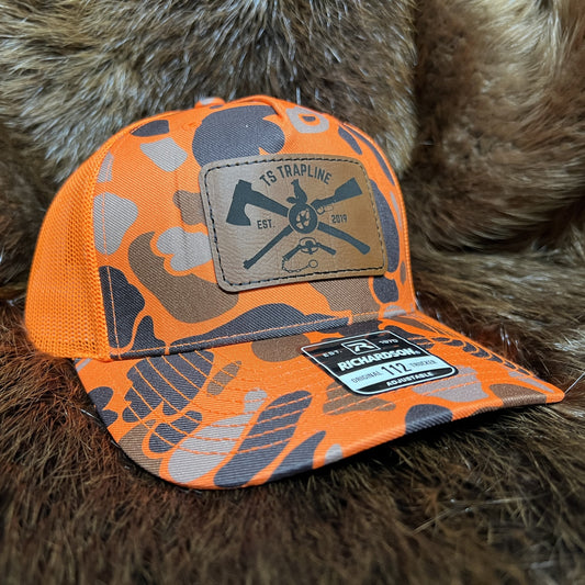 Richardson 112FP Mesh Back Trucker Hat w/ Brown Leather Ax & Rifle Logo Patch