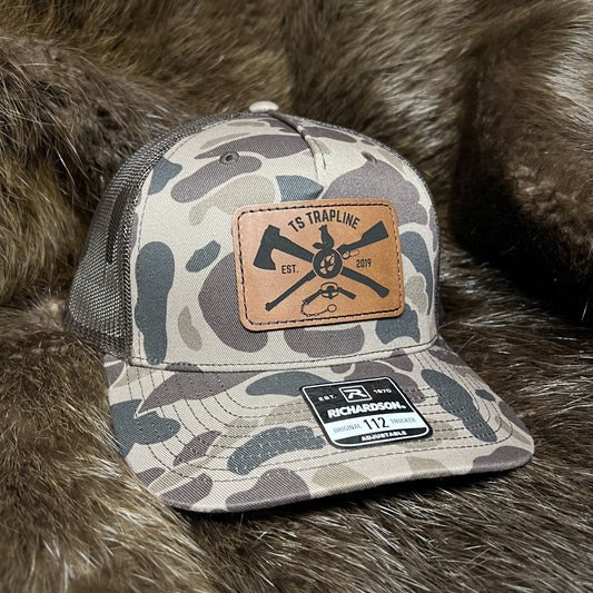 Richardson 112FP Mesh Back Trucker Hat w/ Brown Leather Ax & Rifle Logo Patch