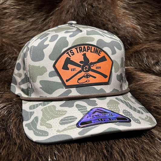 Retro Duck Camo Solid Back Rope Hat w/ Orange Ax & Rifle “Tombstone” Leather patch