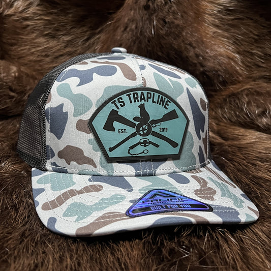 Retro Duck Camo Mesh Back Trucker w/ Topaz Ax & Rifle “Tombstone” Leather patch