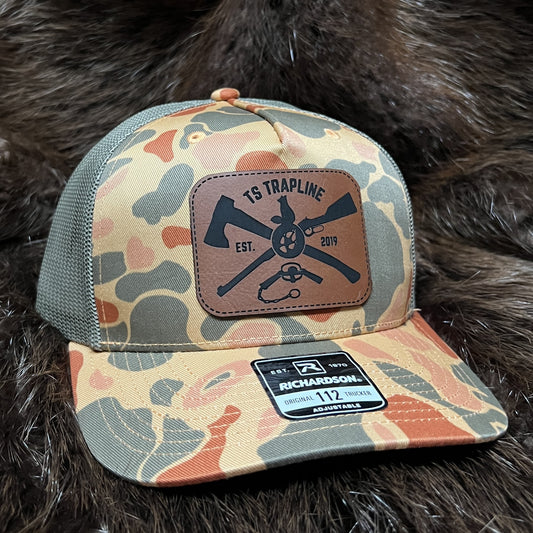 Richardson 112FP Mesh Back Trucker Hat w/ Brown Leather Ax & Rifle Logo Patch