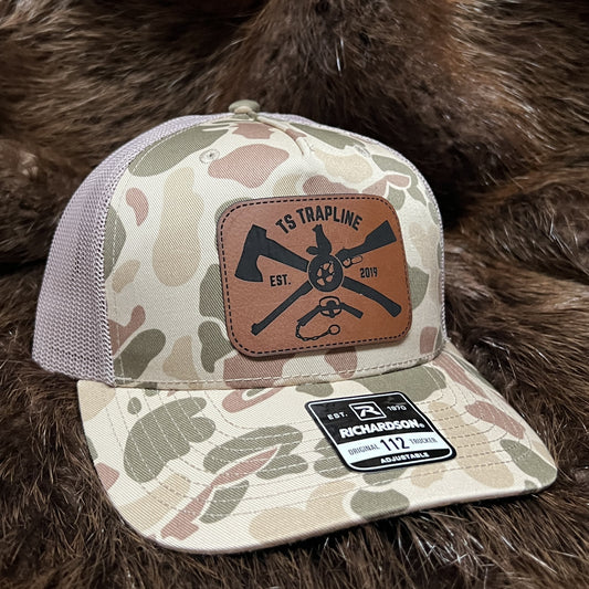 Richardson 112FP Mesh Back Trucker Hat w/ Brown Leather Ax & Rifle Logo Patch